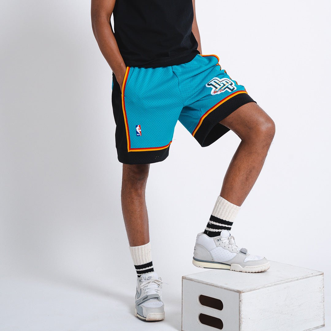 teal pistons shorts